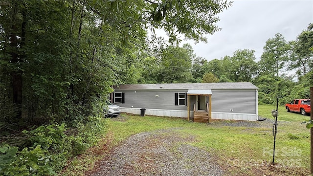 143 Hamilton Rd, Rutherfordton, NC 28139 - back of house featuring entry steps, a lawn, and driveway