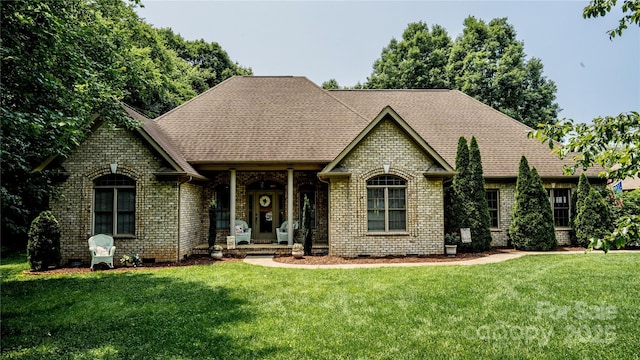 3273 16th St NE, Hickory, NC 28601 - view of front of house featuring a front yard, brick siding, crawl space, and a shingled roof