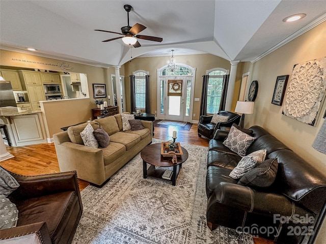 3273 16th St NE, Hickory, NC 28601 - living room with ornate columns, arched walkways, wood finished floors, lofted ceiling, and a ceiling fan