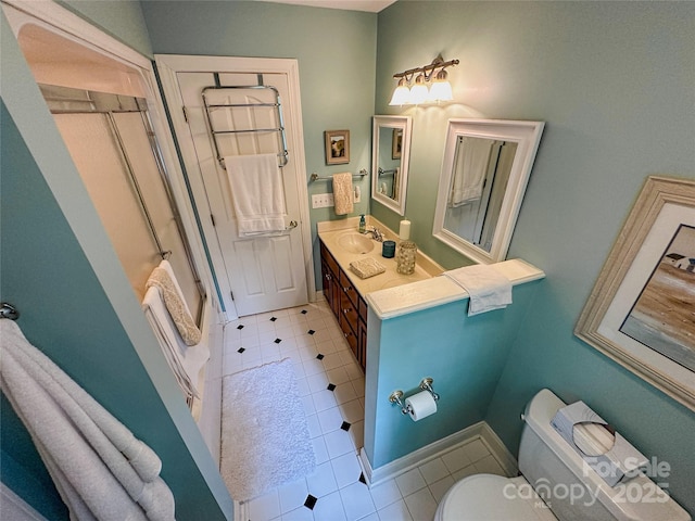 3273 16th St NE, Hickory, NC 28601 - bathroom featuring toilet, tile patterned floors, double vanity, and combined bath / shower with glass door