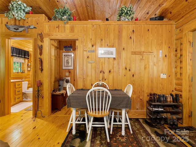 125 Cypress Ln, Saluda, NC 28773 - dining space featuring hardwood / wood-style floors, wood ceiling, and wood walls