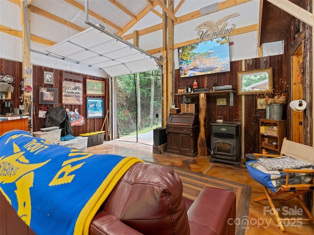 125 Cypress Ln, Saluda, NC 28773 - living area with a wood stove and wooden walls