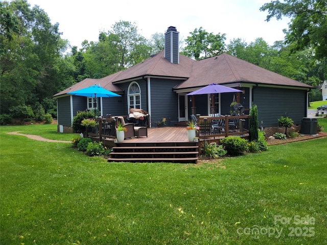 2777 Old S Ct NW, Concord, NC 28027 - back of house featuring a chimney, a yard, and a wooden deck