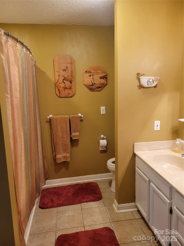 2777 Old S Ct NW, Concord, NC 28027 - bathroom featuring vanity, a textured ceiling, tile patterned flooring, and curtained shower