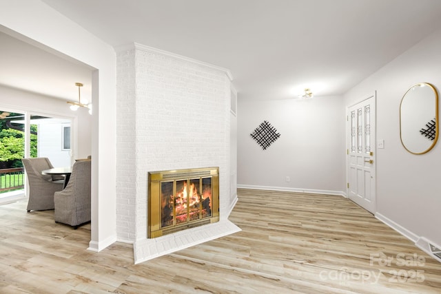 4913 Seacroft Rd, Charlotte, NC 28210 - living room with wood finished floors and a brick fireplace