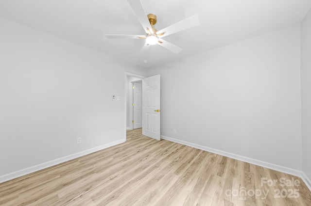 4913 Seacroft Rd, Charlotte, NC 28210 - empty room with light wood-style flooring and a ceiling fan