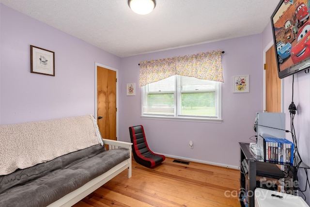 310 Yarbro Rd, Kings Mountain, NC 28086 - sitting room with wood finished floors and baseboards
