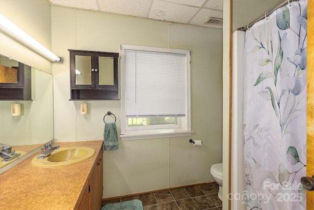 310 Yarbro Rd, Kings Mountain, NC 28086 - full bathroom with a paneled ceiling, vanity, toilet, baseboards, and a shower with shower curtain