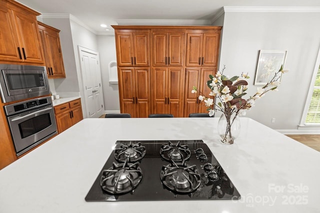 11139 Tradition View Dr, Charlotte, NC 28269 - kitchen featuring stainless steel appliances, light countertops, crown molding, brown cabinets, and recessed lighting