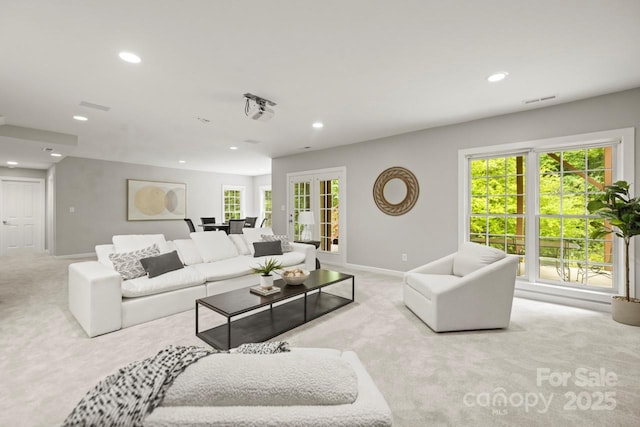11139 Tradition View Dr, Charlotte, NC 28269 - living area with carpet, recessed lighting, baseboards, and french doors