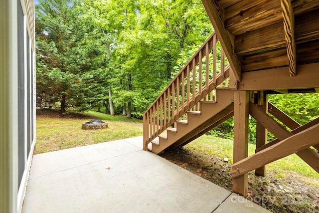 11139 Tradition View Dr, Charlotte, NC 28269 - view of patio / terrace with stairs and an outdoor fire pit