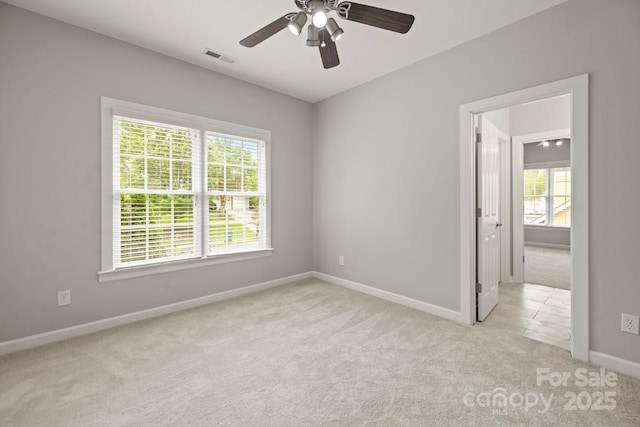 11139 Tradition View Dr, Charlotte, NC 28269 - empty room featuring carpet floors, plenty of natural light, baseboards, and a ceiling fan
