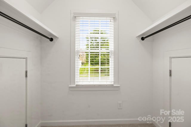 11139 Tradition View Dr, Charlotte, NC 28269 - walk in closet featuring vaulted ceiling