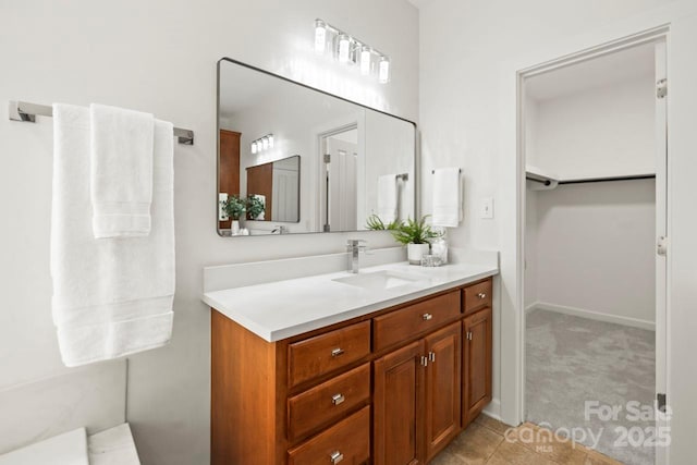 11139 Tradition View Dr, Charlotte, NC 28269 - bathroom with vanity, baseboards, and tile patterned flooring