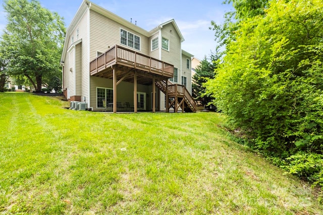 11139 Tradition View Dr, Charlotte, NC 28269 - back of house featuring a deck, stairs, a yard, and central air condition unit
