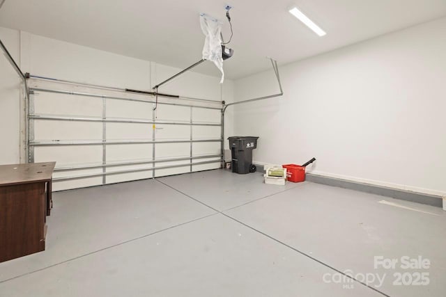 11139 Tradition View Dr, Charlotte, NC 28269 - garage featuring baseboards