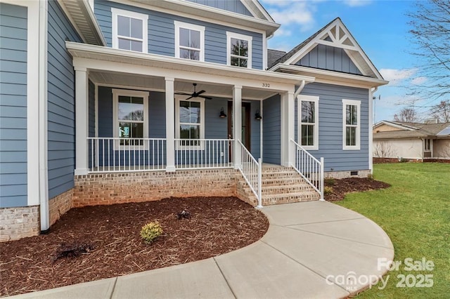 332 Canvasback Rd, Mooresville, NC 28117 - view of front of property featuring board and batten siding, a porch, a front yard, and crawl space