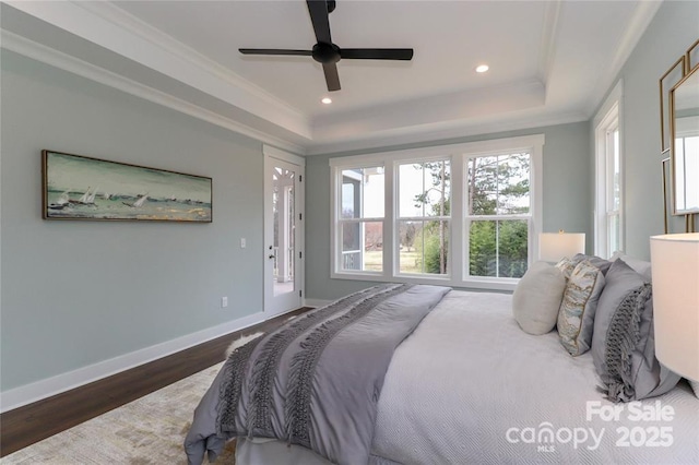 332 Canvasback Rd, Mooresville, NC 28117 - bedroom featuring a tray ceiling, wood finished floors, baseboards, recessed lighting, and a ceiling fan