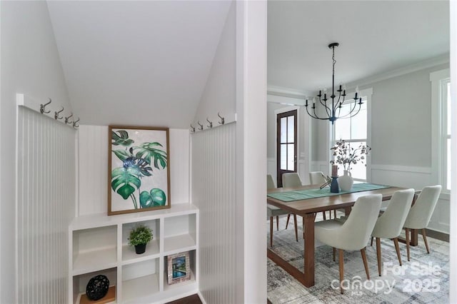 332 Canvasback Rd, Mooresville, NC 28117 - dining space featuring a chandelier, lofted ceiling, and crown molding