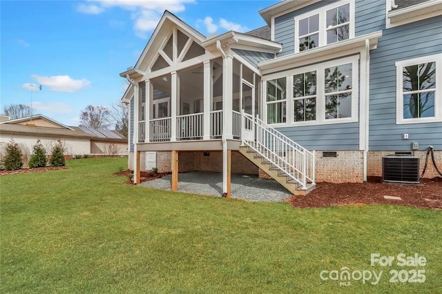 332 Canvasback Rd, Mooresville, NC 28117 - rear view of property featuring crawl space, cooling unit, a sunroom, a yard, and a patio area