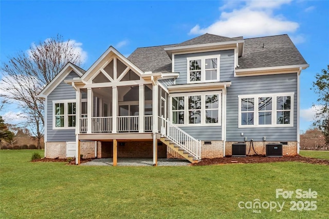 332 Canvasback Rd, Mooresville, NC 28117 - rear view of property featuring crawl space, a sunroom, a yard, and central air condition unit