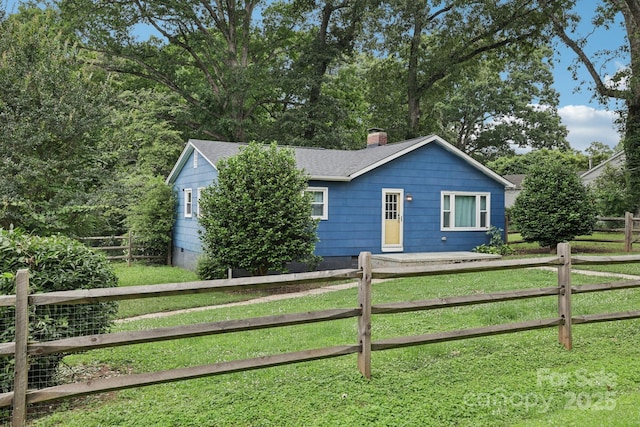 407 Cherry St, Belmont, NC 28012 - view of front facade featuring a chimney and roof with shingles