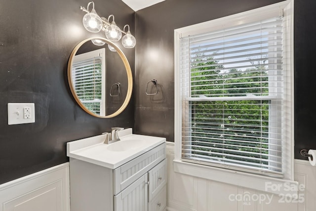 407 Cherry St, Belmont, NC 28012 - bathroom with vanity and a decorative wall