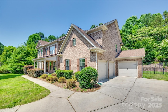 2785 Disney Pl, Indian Land, SC 29707 - view of front of property featuring driveway, a garage, and brick siding