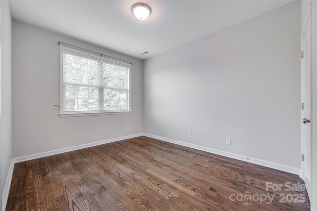 2785 Disney Pl, Indian Land, SC 29707 - unfurnished room with dark wood finished floors and baseboards