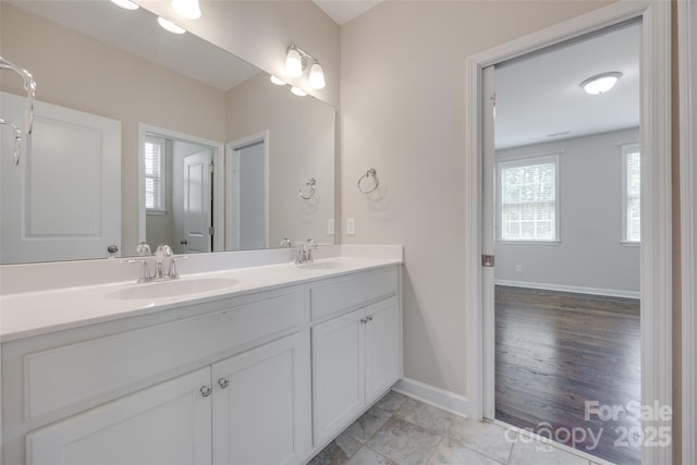 2785 Disney Pl, Indian Land, SC 29707 - bathroom with double vanity and baseboards