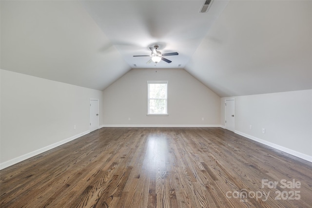 2785 Disney Pl, Indian Land, SC 29707 - bonus room featuring a ceiling fan, dark wood finished floors, lofted ceiling, and baseboards