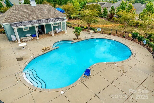 2785 Disney Pl, Indian Land, SC 29707 - community pool featuring a patio and an outbuilding
