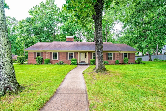 1304 5th Street Cir NW, Hickory, NC 28601 - ranch-style home featuring a chimney, brick siding, and roof with shingles