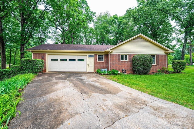 1304 5th Street Cir NW, Hickory, NC 28601 - single story home featuring concrete driveway, brick siding, a front yard, and an attached garage