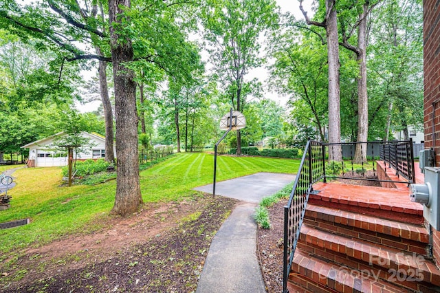 1304 5th Street Cir NW, Hickory, NC 28601 - view of grassy yard with view of wooded area