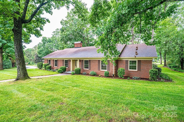 1304 5th Street Cir NW, Hickory, NC 28601 - ranch-style house with a chimney, a front yard, and brick siding