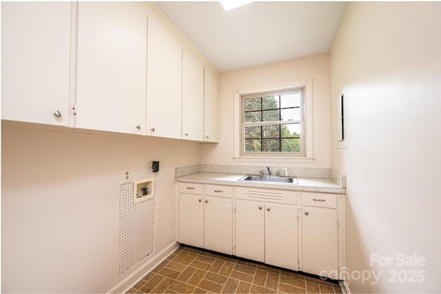 1304 5th Street Cir NW, Hickory, NC 28601 - washroom featuring washer hookup, cabinet space, and baseboards