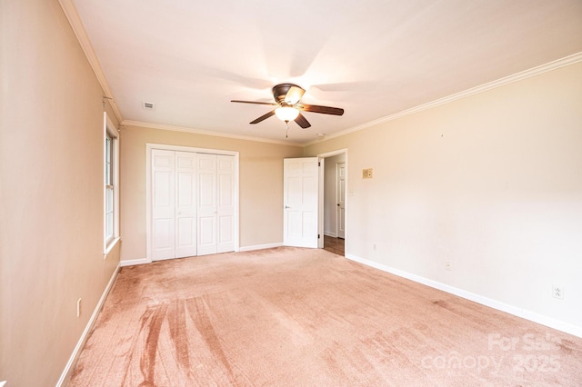 1304 5th Street Cir NW, Hickory, NC 28601 - unfurnished bedroom with ornamental molding, light colored carpet, baseboards, and a closet