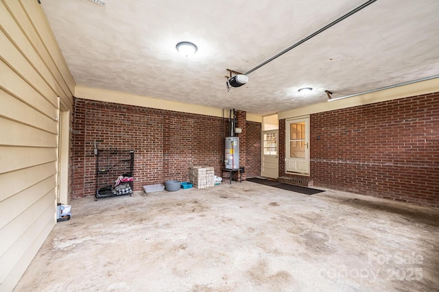 1304 5th Street Cir NW, Hickory, NC 28601 - garage featuring a garage door opener, gas water heater, and a wood stove