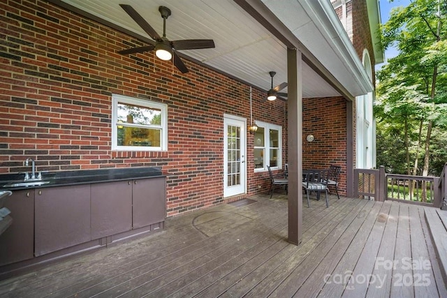 21621 Crown Lake Dr, Cornelius, NC 28031 - deck with ceiling fan and outdoor dining area