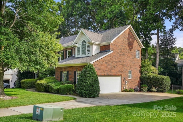 21621 Crown Lake Dr, Cornelius, NC 28031 - view of front of house with brick siding, concrete driveway, and a garage
