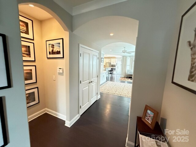 114 Mint Ave Unit A, Mooresville, NC 28117 - hallway with arched walkways, dark wood-type flooring, and recessed lighting