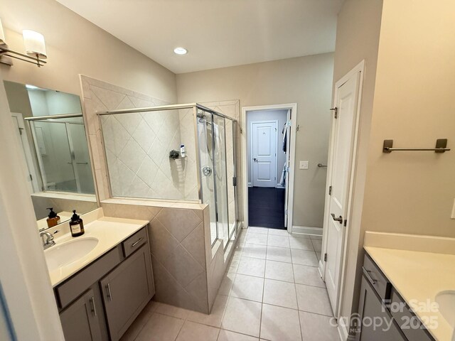 114 Mint Ave Unit A, Mooresville, NC 28117 - full bath with two vanities, a stall shower, and tile patterned floors