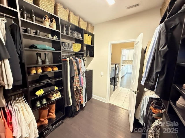 114 Mint Ave Unit A, Mooresville, NC 28117 - walk in closet featuring independent washer and dryer and wood finished floors