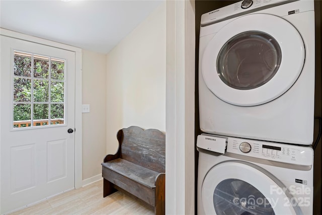 111 Altamahaw Ave, Black Mountain, NC 28711 - washroom featuring stacked washing machine and dryer and baseboards