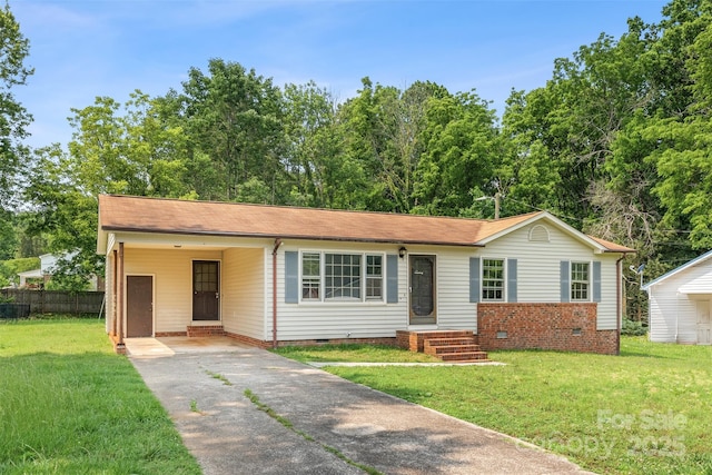 798 Wilson St, China Grove, NC 28023 - ranch-style house with crawl space, concrete driveway, a carport, and a shingled roof