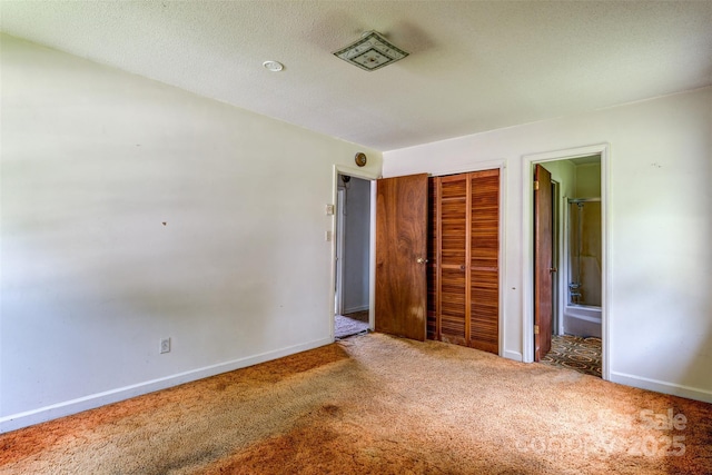 798 Wilson St, China Grove, NC 28023 - unfurnished bedroom featuring carpet flooring, a closet, and baseboards