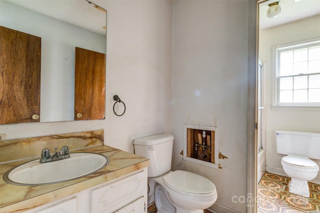 798 Wilson St, China Grove, NC 28023 - bathroom featuring toilet, vanity, and enclosed tub / shower combo