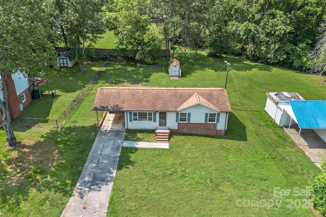 798 Wilson St, China Grove, NC 28023 - view of front of home with concrete driveway and an attached carport