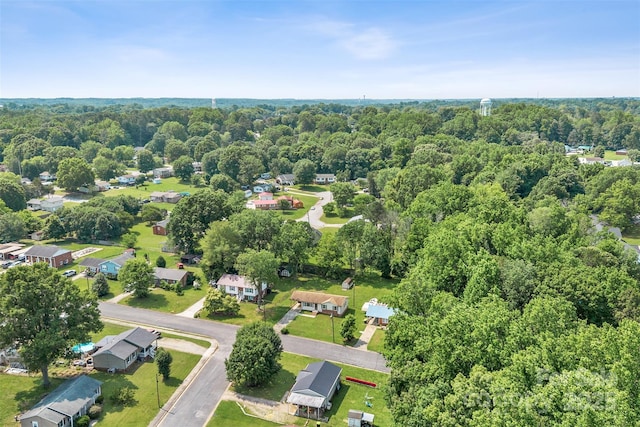 798 Wilson St, China Grove, NC 28023 - aerial perspective of suburban area featuring a forest